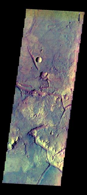 The THEMIS VIS camera contains 5 filters. The data from different filters can be combined in multiple ways to create a false color image. These false color images may reveal subtle variations of the surface not easily identified in a single band image. Today's false color image shows some of the plains of Margaritifer Terra.  Orbit Number: 51484 Latitude: -19.1306 Longitude: 331.896 Instrument: VIS Captured: 2013-07-23 03:11  http://photojournal.jpl.nasa.gov/catalog/PIA21309