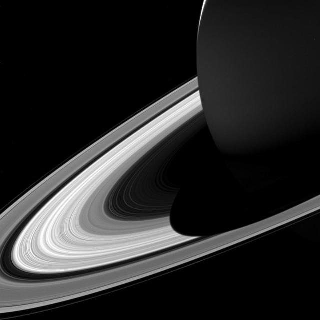 The projection of Saturn's shadow on the rings grows shorter as Saturn's season advances toward northern summer, thanks to the planet's permanent tilt as it orbits the sun. This will continue until Saturn's solstice in May 2017. At that point in time, the shadow will extend only as far as the innermost A ring, leaving the middle and outer A ring completely free of the planet's shadow.  Over the course of NASA's Cassini mission, the shadow of Saturn first lengthened steadily until equinox in August 2009. Since then, the shadow has been shrinking.  This view looks toward the sunlit side of the rings from about 10 degrees above the ring plane. The image was taken in visible light with the Cassini spacecraft wide-angle camera on Feb. 3, 2017.  The view was acquired at a distance of approximately 760,000 miles (1.2 million kilometers) from Saturn. Image scale is 46 miles (73 kilometers) per pixel.  https://photojournal.jpl.nasa.gov/catalog/PIA21328