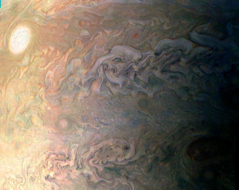 This amateur-processed image was taken on Dec. 11, 2016, at 9:27 a.m. PST (12:27 p.m. EST), as NASA's Juno spacecraft performed its third close flyby of Jupiter. At the time the image was taken, the spacecraft was about 15,200 miles (24,400 kilometers) from the gas giant planet.  The citizen scientist (Eric Jorgensen) cropped the JunoCam image and enhanced the color to draw attention to Jupiter's swirling clouds southeast of the "pearl." The "pearl" is one of eight massive rotating storms at 40 degrees south latitude on Jupiter, known colloquially as the "string of pearls." The processing of this image highlights the turbulence of the clouds in the south temperate belt of the planet.  http://photojournal.jpl.nasa.gov/catalog/PIA21377  .  -    Enhanced image by Eric Jorgensen based on images provided courtesy of NASA/JPL-Caltech/SwRI/MSSS
