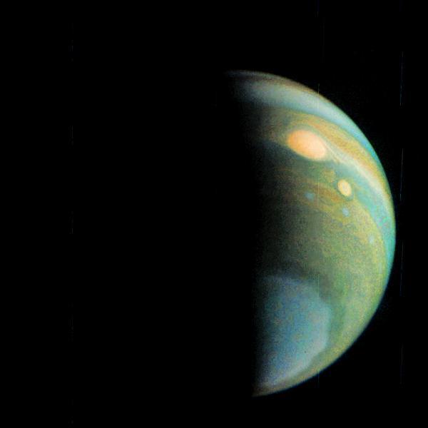 This false color view of Jupiter's polar haze was created by citizen scientist Gerald Eichstädt using data from the JunoCam instrument on NASA's Juno spacecraft.  The image was taken on Dec. 11, 2016 at 2:30 p.m. PST (5:30 p.m. EST), when the spacecraft was 285,000 miles (459,000 kilometers) from Jupiter on the outbound leg of its third close flyby. This image is composited from four images taken through different filters: red, green, blue and methane.  When the near-infrared methane image is processed with the others, the result is a false color product that highlights high clouds and high altitude hazes. The Great Red Spot and Oval BA (just below the Great Red Spot) are high in Jupiter's atmosphere, thus bright in this picture. The high-altitude haze layer over the south pole partially obscures our view of the storms below. By combining the methane data with the visible light images, we can learn about the vertical structure of Jupiter's atmosphere. http://photojournal.jpl.nasa.gov/catalog/PIA21379. -  Enhanced image by Gerald Eichstädt based on images provided courtesy of NASA/JPL-Caltech/SwRI/MSSS