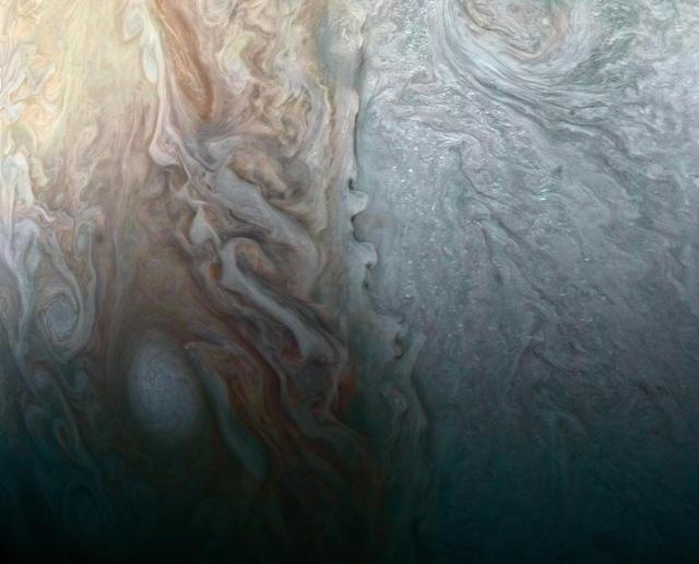 NASA image: When Jovian Light and Dark Collide