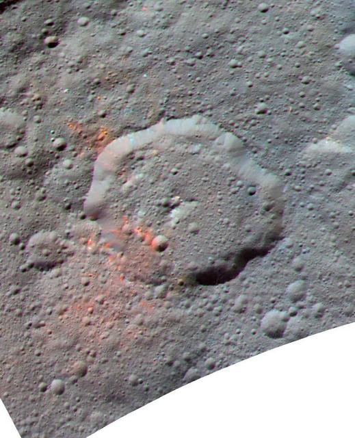 This enhanced color composite image, made with data from the framing camera aboard NASA's Dawn spacecraft, shows the area around Ernutet crater. The bright red portions appear redder with respect to the rest of Ceres. In a 2017 study in the journal Science, researchers from the Dawn science team found that these red areas around Ernutet are associated with evidence of organic material. Images taken using blue (440 nanometers), green (750 nanometers) and infrared (960 nanometers) spectral filters were combined to create the view. Ernutet Crater measures about 32 miles (52 kilometers) in diameter and is located in the northern hemisphere. http://photojournal.jpl.nasa.gov/catalog/PIA21419