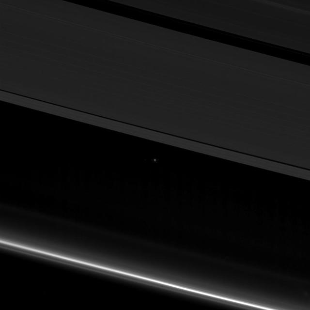NASA image: Earth Between the Rings of Saturn