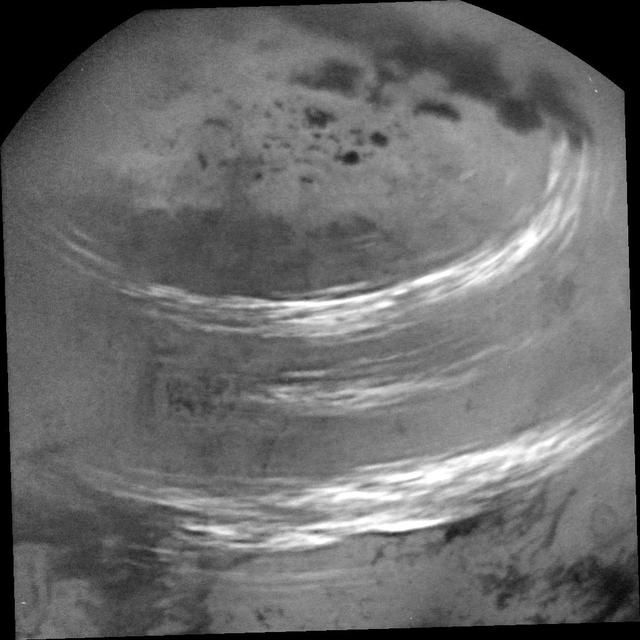 NASA image: Cloud Bands Streak Across Titan