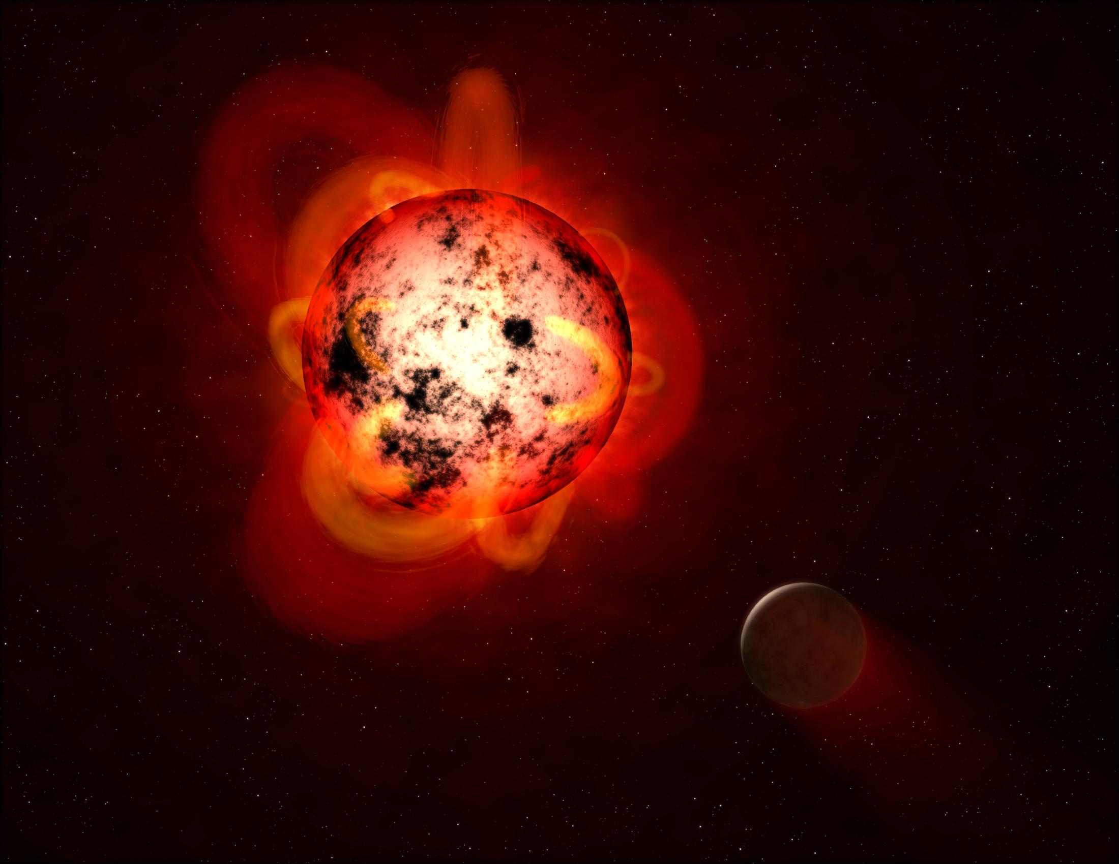 This illustration shows a red dwarf star orbited by a hypothetical exoplanet. By mining data from NASA's GALEX spacecraft, a team of astronomers identified dozens of flares at a range of durations and strengths.