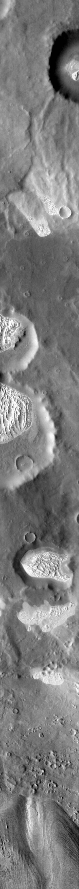 This infrared image from NASA 2001 Mars Odyssey spacecraft covers a large swath of Terra Cimmeria, including numerous craters with dunes and dune fields on their floors, as well as dunes located on the plains between craters.  Orbit Number: 66840 Latitude: -68.6677 Longitude: 163.443 Instrument: IR Captured: 2017-01-07 11:57  http://photojournal.jpl.nasa.gov/catalog/PIA21505