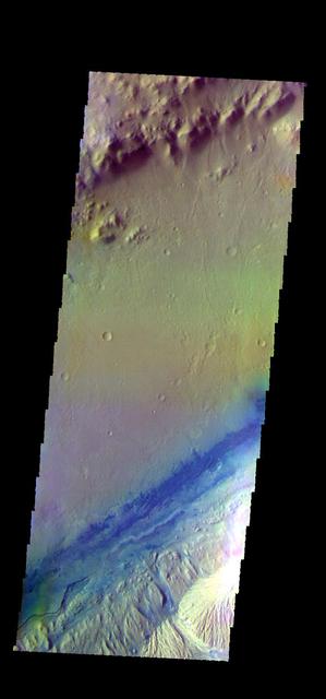The THEMIS VIS camera contains 5 filters. The data from different filters can be combined in multiple ways to create a false color image. These false color images may reveal subtle variations of the surface not easily identified in a single band image. Today's false color image shows part of Gale Crater. The Curiosity Rover is located in Gale Crater. Orbit Number: 52390 Latitude: -4.49318 Longitude: 137.423 Instrument: VIS Captured: 2013-10-05 16:16 https://photojournal.jpl.nasa.gov/catalog/PIA21530