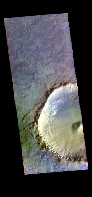 The THEMIS camera contains 5 filters. The data from different filters can be combined in multiple ways to create a false color image. These false color images may reveal subtle variations of the surface not easily identified in a single band image. This image from NASA 2001 Mars Odyssey spacecraft shows an unnamed crater located on the floor of Newton Crater. Orbit Number: 57962 Latitude: -42.1218 Longitude: 201.814 Instrument: VIS Captured: 2015-01-07 07:47 https://photojournal.jpl.nasa.gov/catalog/PIA21539