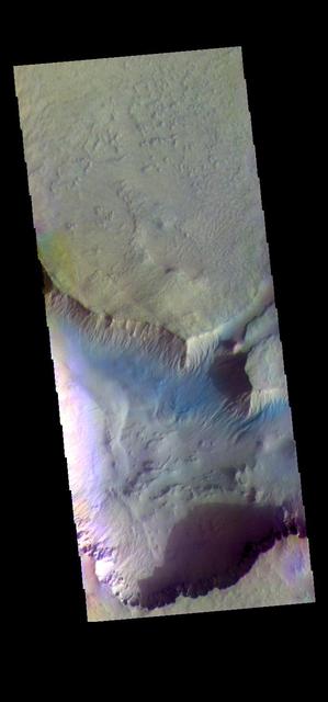 The THEMIS camera contains 5 filters. The data from different filters can be combined in multiple ways to create a false color image. These false color images may reveal subtle variations of the surface not easily identified in a single band image. This image from NASA 2001 Mars Odyssey spacecraft shows more of Asimov Crater. Orbit Number: 58206 Latitude: -47.4085 Longitude: 4.59969 Instrument: VIS Captured: 2015-01-27 09:56 https://photojournal.jpl.nasa.gov/catalog/PIA21544