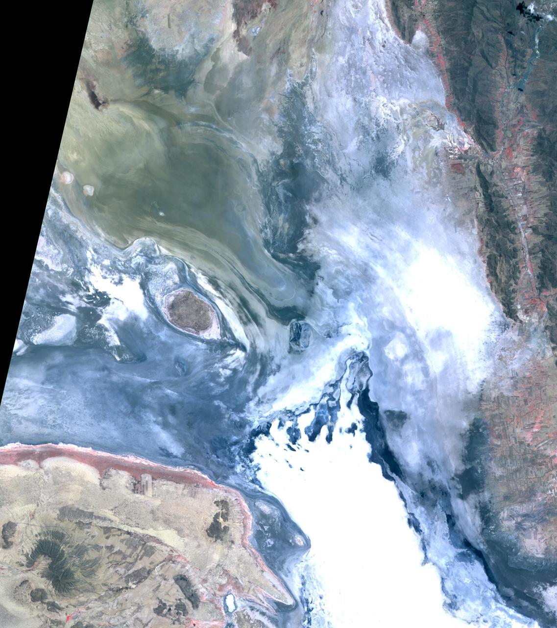 In the high plains of the Andes in Bolivia, Lake Poopo has virtually vanished, as shown in this image from NASA Terra spacecraft. Once covering over 3,000 square kilometers, the lake essentially dried up in 2015. What led to Lake Poopo's demise? Water diversions upstream, weather extremes and recurrent droughts are thought to blame. The images cover an area of 48.9 by 55.1 km, were acquired February 14, 2001 and November 6, 2016, and are located near 18.7 degrees south, 67.1 degrees west.   https://photojournal.jpl.nasa.gov/catalog/PIA21546