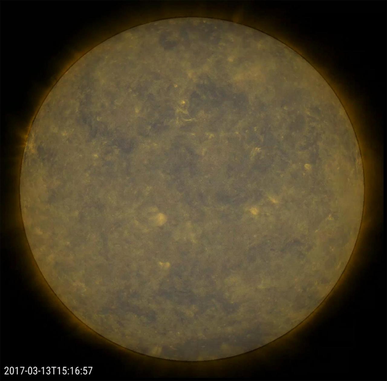 The sun has been virtually spotless, as in no sunspots, over the past 11 days, a spotless stretch that we have not seen since the last solar minimum many years ago. The videos shows the past four days (Mar. 14-17, 2017) with a combination of an extreme ultraviolet image blended with just the filtered sun. If we just showed the filtered sun with no spots for reference points, any viewer would have a hard time telling that the sun was even rotating. The sun is trending again towards the solar minimum period of its 11 year cycle, which is predicted to be around 2020.  Movies are available at http://photojournal.jpl.nasa.gov/catalog/PIA21569