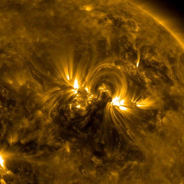 NASA image: Solar Golden Arches
