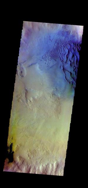 The THEMIS VIS camera contains 5 filters. The data from different filters can be combined in multiple ways to create a false color image. These false color images may reveal subtle variations of the surface not easily identified in a single band image. Today's false color image shows dunes on the floor of an unnamed crater in Noachis Terra. Orbit Number: 58960 Latitude: -48.9257 Longitude: 33.7526 Instrument: VIS Captured: 2015-03-30 11:31 https://photojournal.jpl.nasa.gov/catalog/PIA21666