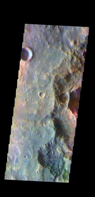 The THEMIS VIS camera contains 5 filters. The data from different filters can be combined in multiple ways to create a false color image. These false color images may reveal subtle variations of the surface not easily identified in a single band image. Today's false color image shows part of the plains of Terra Cimmeria.  Orbit Number: 59219 Latitude: -9.46406 Longitude: 128.617 Instrument: VIS Captured: 2015-04-20 19:09  https://photojournal.jpl.nasa.gov/catalog/PIA21668
