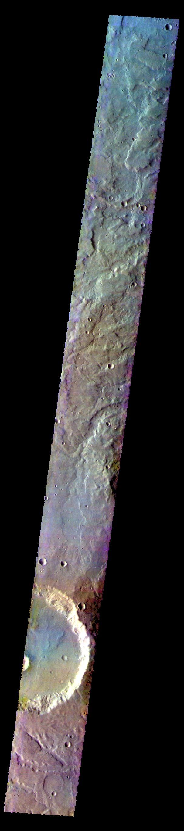 The THEMIS VIS camera contains 5 filters. The data from different filters can be combined in multiple ways to create a false color image. These false color images may reveal subtle variations of the surface not easily identified in a single band image. Today's false color images shows part of the plains and craters of Terra Cimmeria.  Orbit Number: 59405 Latitude: -38.6916 Longitude: 158.645 Instrument: VIS Captured: 2015-05-06 02:53  https://photojournal.jpl.nasa.gov/catalog/PIA21671