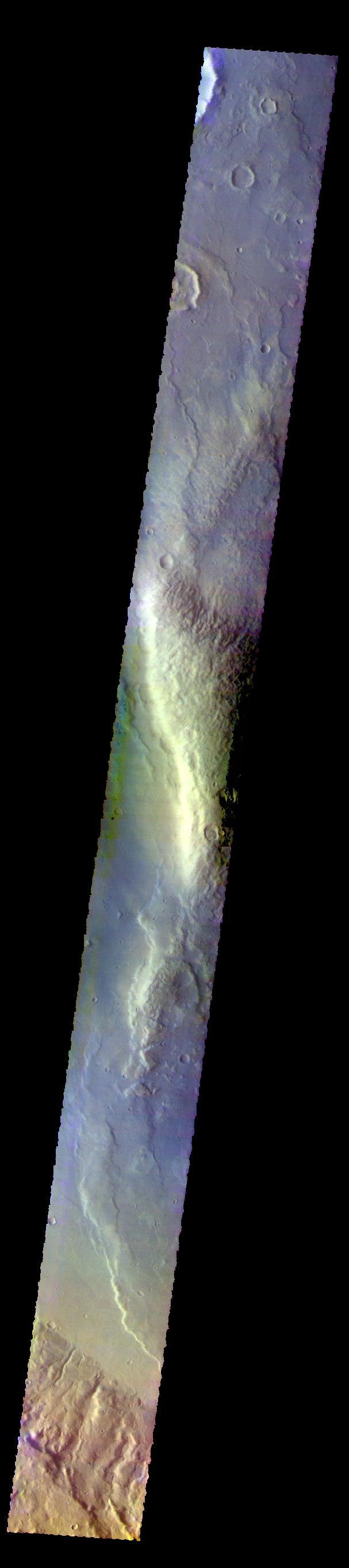 The THEMIS VIS camera contains 5 filters. The data from different filters can be combined in multiple ways to create a false color image. These false color images may reveal subtle variations of the surface not easily identified in a single band image. Today's false color images shows part of the large ridge on the floor of Newton Crater in Terra Sirenum.  Orbit Number: 59416 Latitude: -41.0768 Longitude: 200.911 Instrument: VIS Captured: 2015-05-07 00:38  https://photojournal.jpl.nasa.gov/catalog/PIA21672