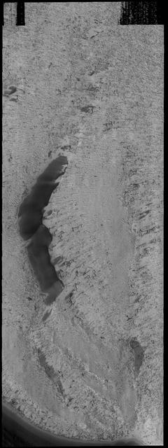 This VIS image shows more of the variety of textures on the south polar cap.  Orbit Number: 68068 Latitude: -86.1964 Longitude: 308.717 Instrument: VIS Captured: 2017-04-18 16:22  https://photojournal.jpl.nasa.gov/catalog/PIA21681