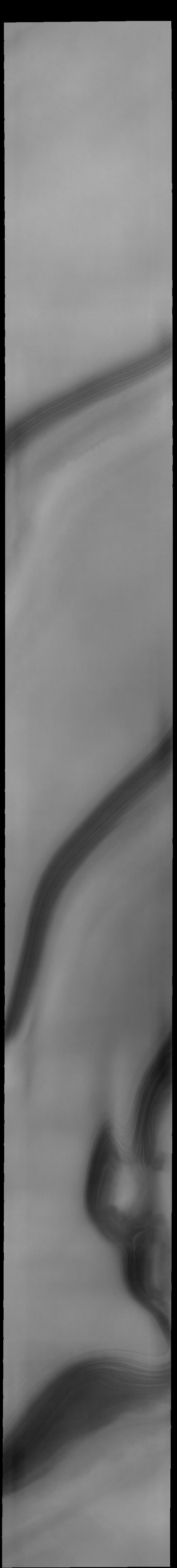 What resembles a person's profile appears at the bottom of this image captured by NASA's 2001 Mars Odyssey spacecraft.  Orbit Number: 62090 Latitude: 86.072 Longitude: 132.944 Instrument: VIS Captured: 2015-12-13 06:42  https://photojournal.jpl.nasa.gov/catalog/PIA21694