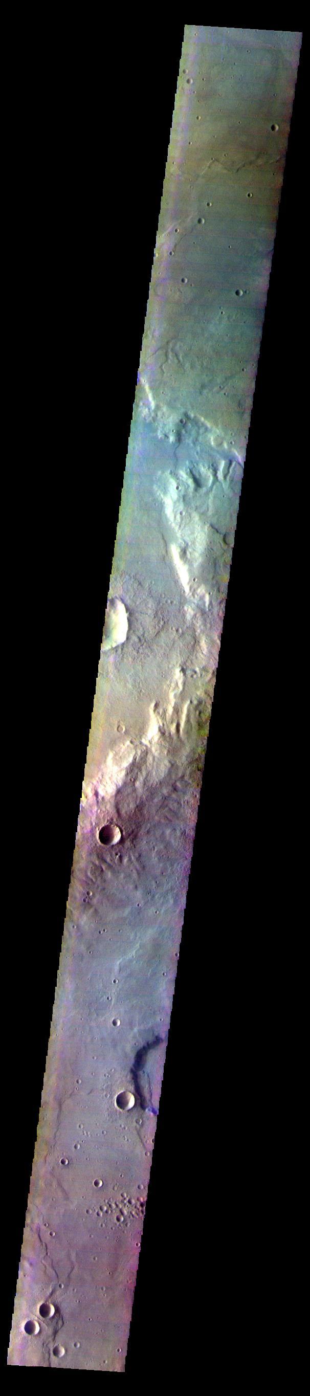 The THEMIS VIS camera contains 5 filters. The data from different filters can be combined in multiple ways to create a false color image. These false color images may reveal subtle variations of the surface not easily identified in a single band image. Today's false color image shows part of Corozal Crater in Terra Cimmeria.  Orbit Number: 59667 Latitude: -39.1635 Longitude: 160.407 Instrument: VIS Captured: 2015-05-27 16:41  https://photojournal.jpl.nasa.gov/catalog/PIA21700