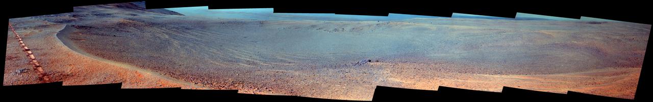 NASA's Opportunity Mars rover passed near this small, relatively fresh crater in April 2017, during the 45th anniversary of the Apollo 16 mission to the moon. The rover team chose to call it "Orion Crater," after the Apollo 16 lunar module. The rover's Panoramic Camera (Pancam) recorded this view, presented in enhanced color to make differences in surface materials more easily visible. The crater's diameter is about 90 feet (27 meters). From the small amount of erosion or filling that Orion Crater has experienced, its age is estimated at no more than 10 million years. It lies on the western rim of Endeavour Crater. For comparison, Endeavor is about 14 miles (22 kilometers) in diameter and more than 3.6 billion years old. This view combines multiple images taken through three different Pancam filters. The selected filters admit light centered on wavelengths of 753 nanometers (near-infrared), 535 nanometers (green) and 432 nanometers (violet). The component images were taken on April 26, 2017, during the 4,712th Martian day, or sol, of Opportunity's work on Mars. Apollo 16 astronauts John Young and Charles Duke flew in the Orion lunar module to and from the first human landing in the lunar highlands while Ken Mattingly orbited the moon in the command module, Casper. On the moon, Young and Duke investigated Plum Crater, which is approximately the same size as Mars' Orion Crater. https://photojournal.jpl.nasa.gov/catalog/PIA21707