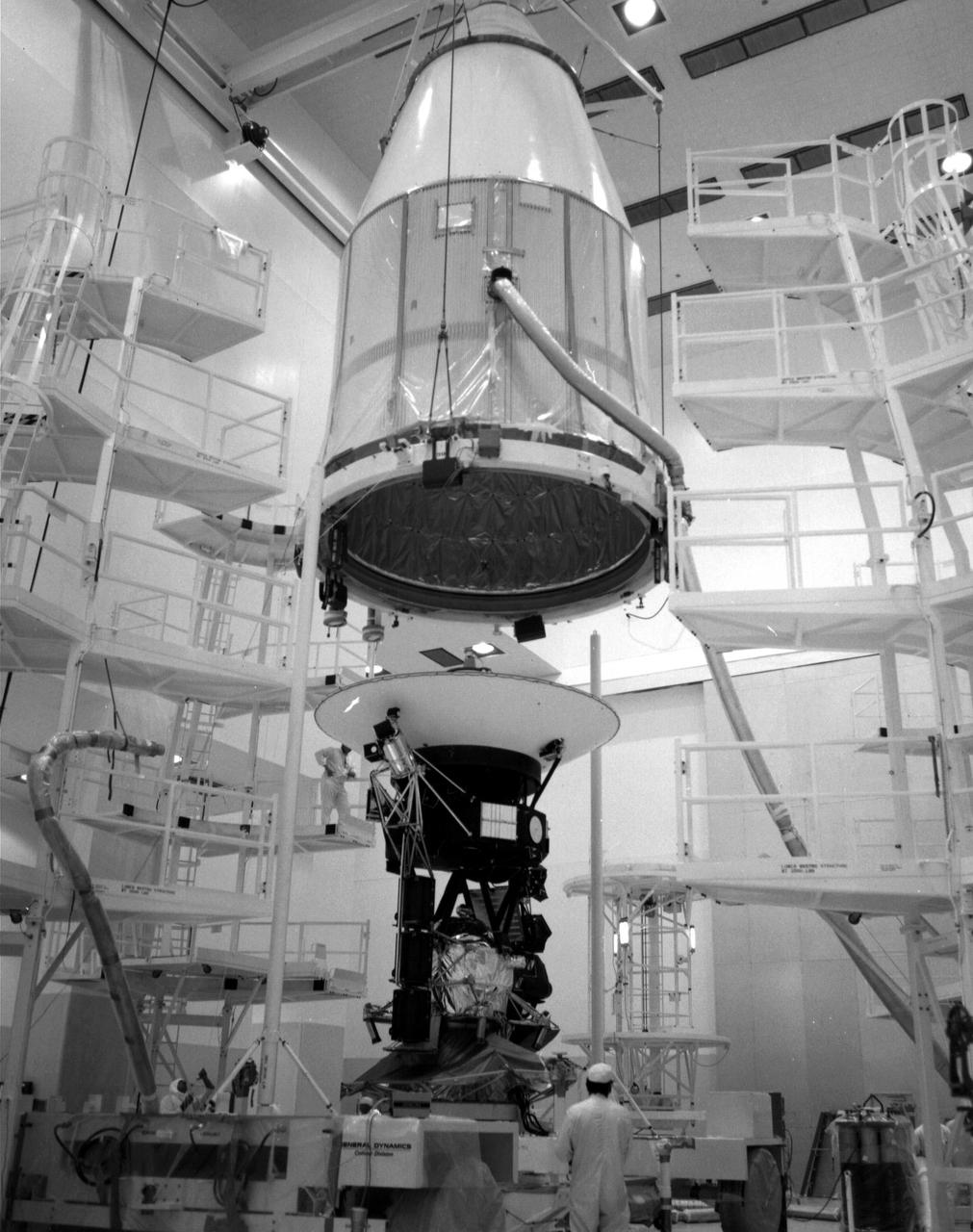 The Voyager 2 spacecraft, which was the first of the two Voyagers to launch, is seen at the Spacecraft Assembly and Encapsulation Facility-1 at NASA's Kennedy Space Center in Cape Canaveral, Florida. This archival photo is from August 1977. The spacecraft was put into this shroud on August 2, 1977, to protect it during flight through the atmosphere.   https://photojournal.jpl.nasa.gov/catalog/PIA21743