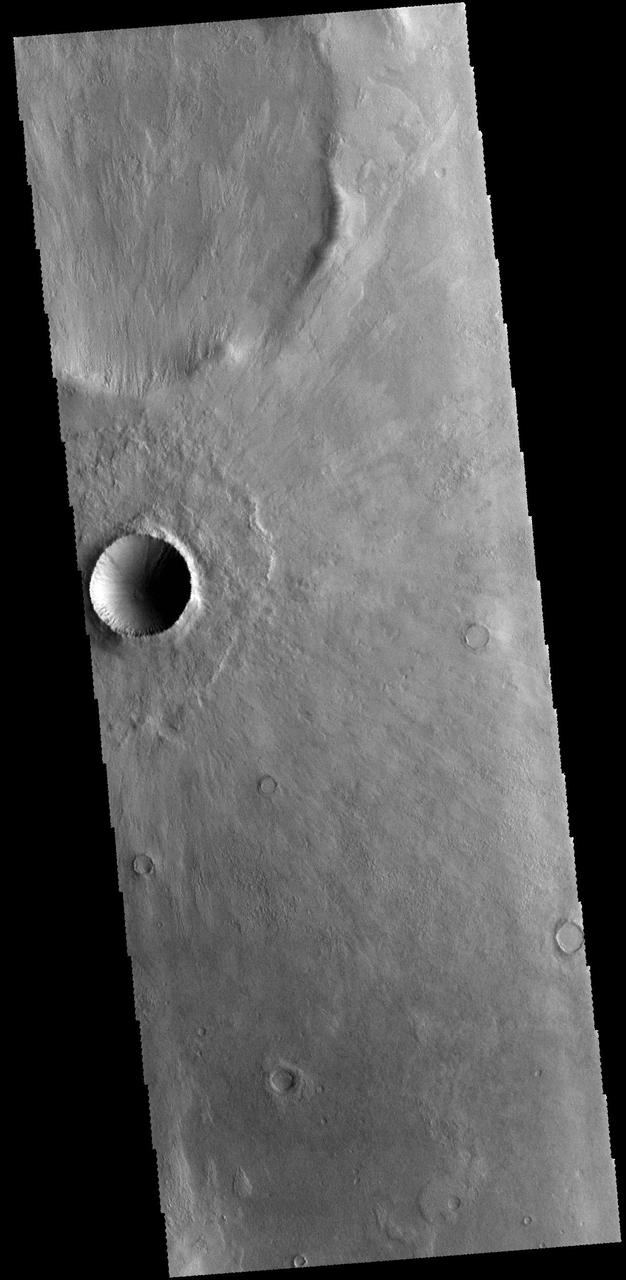 This VIS image shows an unnamed crater in Terra Cimmeria. Note how the ejecta overlays the surrounding terrain, radial to the crater. Orbit Number: 68431 Latitude: -44.3744 Longitude: 139.441 Instrument: VIS Captured: 2017-05-18 14:27 https://photojournal.jpl.nasa.gov/catalog/PIA21789