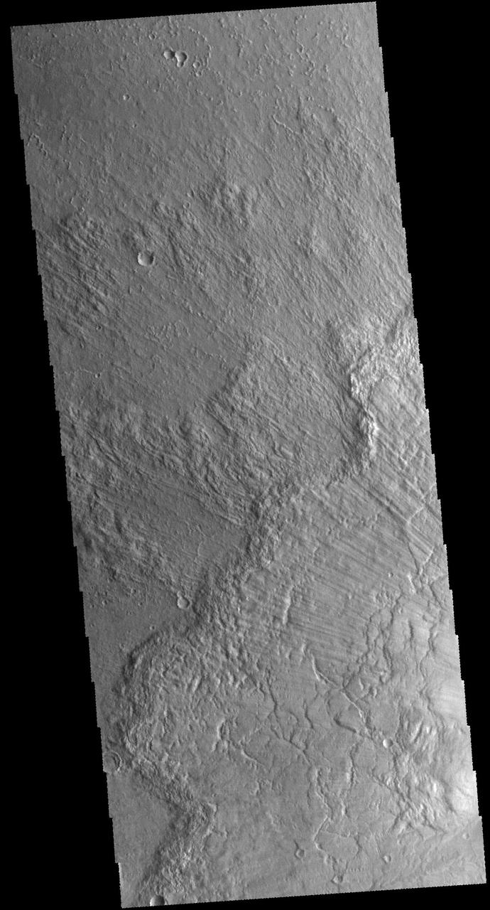 Today's VIS image shows some of the ejecta from Bacolor Crater in Utopia Planitia. There are several layers of ejecta visible in the image. The crater itself is just off the image to the lower right. Orbit Number: 68581 Latitude: 33.2419 Longitude: 118.099 Instrument: VIS Captured: 2017-05-30 23:30 https://photojournal.jpl.nasa.gov/catalog/PIA21790