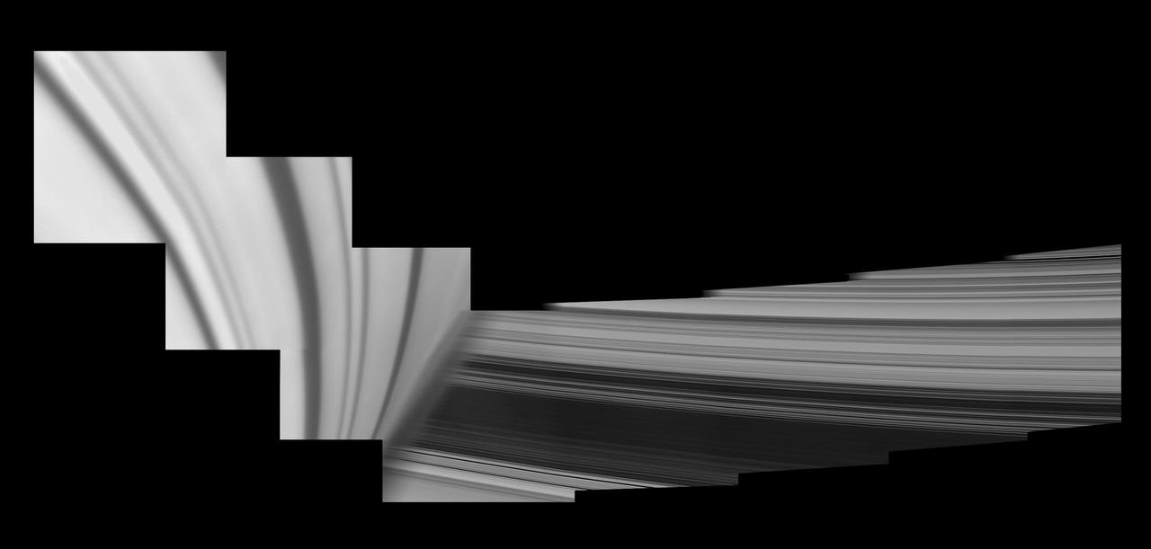 Cassini obtained the images in this mosaic on May 28, 2017, looking over the horizon just after its sixth pass through the gap between Saturn and its rings as part of the mission's Grand Finale. In this view, Saturn looms in the foreground on the left, adorned by ring shadows. To the right, the rings emerge from behind the planet's hazy limb, stretching outward from Cassini's perspective. The view is of the rings' unilluminated face, where sunlight filters through from the other side. The part of the planet seen here is in the southern hemisphere. . For another mosaic showing the view from between Saturn and the rings, see PIA21898. A previously released movie sequence showed Cassini's changing view, gazing out upon the rings as the spacecraft passed through the ring plane from north to south (see PIA21886). The Cassini spacecraft ended its mission on Sept. 15, 2017. A wider, uncropped version of the mosaic, which shows more of the rings, is also available at https://photojournal.jpl.nasa.gov/catalog/PIA21897