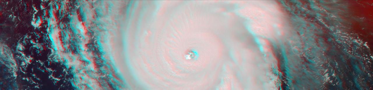On Sept. 7, the Multi-angle Imaging SpectroRadiometer (MISR) instrument on NASA's Terra satellite passed over Hurricane Irma at approximately 11:20 am local time. The MISR instrument comprises nine cameras that view the Earth at different angles, and since it takes roughly seven minutes for all nine cameras to capture the same location, the motion of the clouds between images allows scientists to calculate the wind speed at the cloud tops.  This stereo anaglyph combines two of the MISR angles to show a three-dimensional view of Irma. You will need red-blue glasses to view the anaglyph; place the red lens over your left eye.  At this time, Irma's eye was located approximately 60 miles (100 kilometers) north of the Dominican Republic and 140 miles (230 kilometers) north of its capital, Santo Domingo. Irma was a powerful Category 5 hurricane, with wind speeds at the ocean surface up to 185 miles (300 kilometers) per hour. The MISR data show that at cloud top, winds near the eye wall (the most destructive part of the storm) were approximately 90 miles per hour (145 kilometers per hour), and the maximum cloud-top wind speed throughout the storm calculated by MISR was 135 miles per hour (220 kilometers per hour). While the hurricane's dominant rotation direction is counter-clockwise, winds near the eye wall are consistently pointing outward from it. This is an indication of outflow, the process by which a hurricane draws in warm, moist air at the surface and ejects cool, dry air at its cloud tops.   https://photojournal.jpl.nasa.gov/catalog/PIA21945