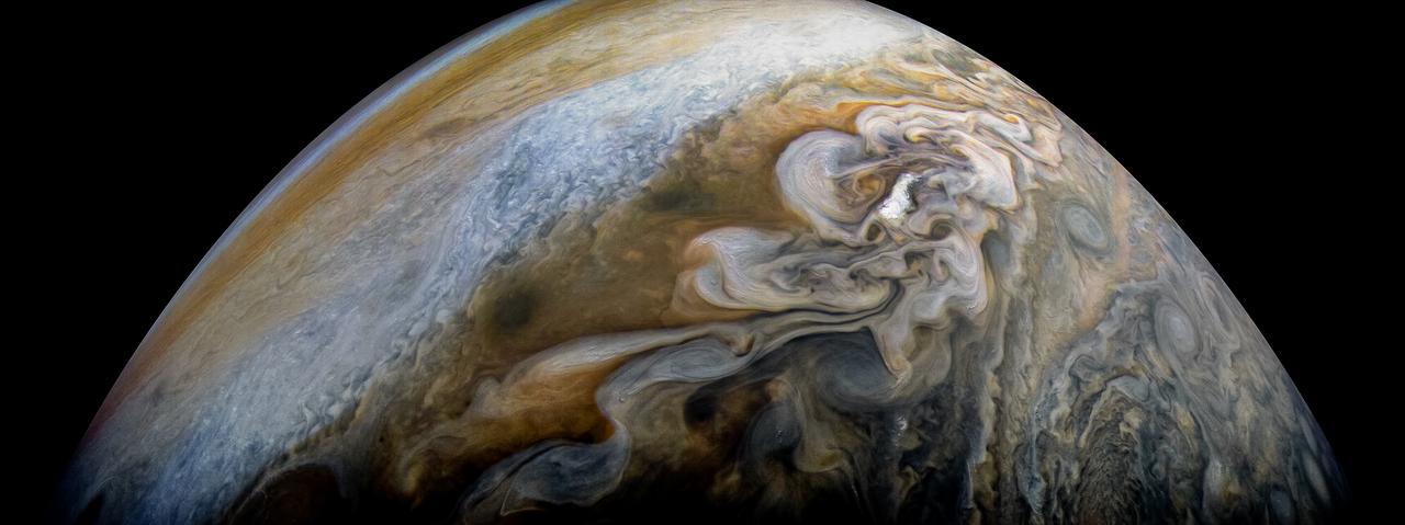 See swirling cloud formations in the northern area of Jupiter's north temperate belt in this new view taken by NASA's Juno spacecraft.  The color-enhanced image was taken on Feb. 7 at 5:42 a.m. PST (8:42 a.m. EST), as Juno performed its eleventh close flyby of Jupiter. At the time the image was taken, the spacecraft was about 5,086 miles (8,186 kilometers) from the tops of the clouds of the planet at a latitude of 39.9 degrees. Citizen scientist Kevin M. Gill processed this image using data from the JunoCam imager. https://photojournal.jpl.nasa.gov/catalog/PIA21978 . -  Enhanced image by Kevin M. Gill (CC-BY) based on images provided courtesy of NASA/JPL-Caltech/SwRI/MSSS