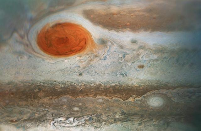 This image of Jupiter's iconic Great Red Spot and surrounding turbulent zones was captured by NASA's Juno spacecraft. The color-enhanced image is a combination of three separate images taken on April 1 between 3:09 a.m. PDT (6:09 a.m. EDT) and 3:24 a.m. PDT (6:24 a.m. EDT), as Juno performed its 12th close flyby of Jupiter. At the time the images were taken, the spacecraft was 15,379 miles (24,749 kilometers) to 30,633 miles (49,299 kilometers) from the tops of the clouds of the planet at a southern latitude spanning 43.2 to 62.1 degrees. Citizen scientists Gerald Eichstädt and Seán Doran processed this image using data from the JunoCam imager. https://photojournal.jpl.nasa.gov/catalog/PIA21985