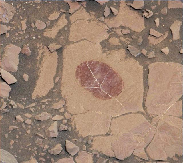 NASA image: Curiosity Checks Under the Dust on a Martian Rock