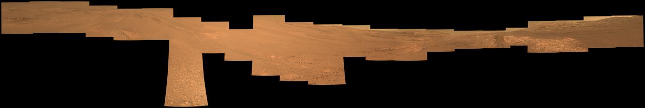 This view from within "Perseverance Valley," on the inner slope of the western rim of Endurance Crater on Mars, includes wheel tracks from the Opportunity rover's descent of the valley. The Panoramic Camera (Pancam) on Opportunity's mast took the component images of the scene during the period Sept. 4 through Oct. 6, 2017, corresponding to sols (Martian days) 4840 through 4871 of the rover's work on Mars.  Perseverance Valley is a system of shallow troughs descending eastward about the length of two football fields from the crest of the crater rim to the floor of the crater. This panorama spans from northeast on the left to northwest on the right, including portions of the crater floor (eastward) in the left half and of the rim (westward) in the right half. Opportunity began descending Perseverance Valley in mid-2017 (see map) as part of an investigation into how the valley formed.  Rover wheel tracks are darker brown, between two patches of bright bedrock, receding toward the horizon in the right half of the scene.  This view combines multiple images taken through three different Pancam filters. The selected filters admit light centered on wavelengths of 753 nanometers (near-infrared), 535 nanometers (green) and 432 nanometers (violet). The three color bands are combined here to show approximately true color.  A map and high-resolution TIFF file is available at https://photojournal.jpl.nasa.gov/catalog/PIA22074