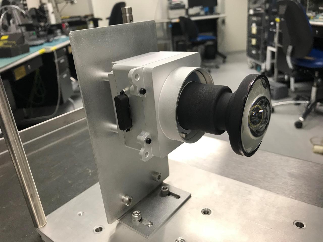 This image shows one of the enhanced engineering cameras with a prototype lens for the Hazcams, which will watch for obstacles encountered by NASA's Mars 2020 rover.  https://photojournal.jpl.nasa.gov/catalog/PIA22102