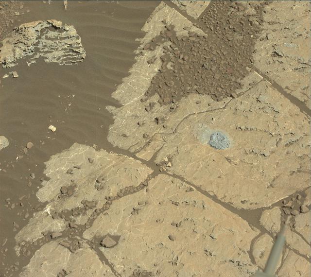 NASA's Curiosity Mars rover used a new drill method to produce a hole on Feb. 26, 2018, in a target named Lake Orcadie. The hole marks the first operation of the rover's drill since a motor problem began acting up more than a year ago.  An early test produced a hole about a half-inch (1-centimeter) deep at Lake Orcadie --- not enough for a full scientific sample, but enough to validate that the new method works mechanically. This was just the first in what will be a series of tests to determine how well the new drill method can collect samples.  A video is available at https://photojournal.jpl.nasa.gov/catalog/PIA22224