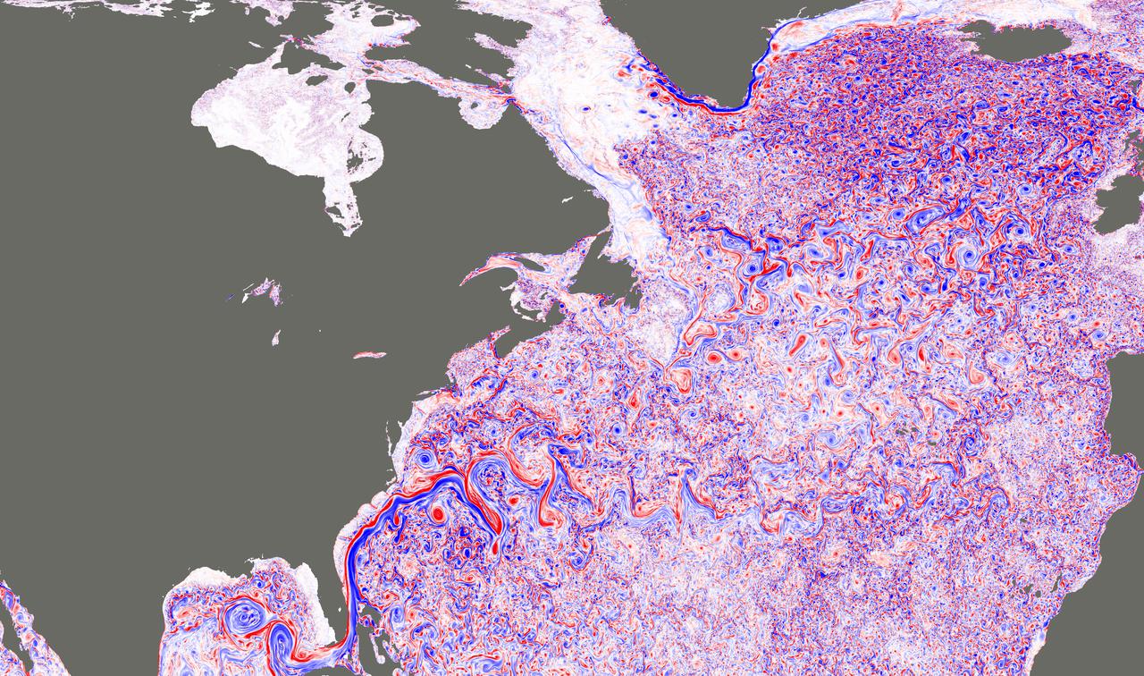 This image shows a simulated snapshot of ocean turbulence in the North Atlantic Ocean in March 2012, from a groundbreaking super-high-resolution global ocean simulation (approximately 1.2 miles, or 2 kilometers, horizontal resolution) developed at JPL (http://wwwcvs.mitgcm.org/viewvc/MITgcm/MITgcm_contrib/llc_hires/llc_4320/). The colors represent the magnitude of surface relative vorticity, a measure of the spin of fluid parcels. The image emphasizes fast-rotating, small-scale (defined here as 6.2 to 31-mile, or 10 to 50 kilometer, range) turbulence, especially during the winter. High levels of relative vorticity caused by small-scale turbulence are believed to strongly transport heat and carbon vertically in the ocean.  The image appears in a study (Su et al. 2018), entitled "Ocean submesoscales as a key component of the global heat budget," published recently in Nature Communications. The study suggests that upper-ocean small-scale turbulence transports heat upward in the ocean at a level five times larger than larger-scale heat transport by ocean eddies, significantly affecting the exchange of heat between the ocean interior and atmosphere. Such interactions have a crucial impact on the Earth's climate.  A movie is available at https://photojournal.jpl.nasa.gov/catalog/PIA22256