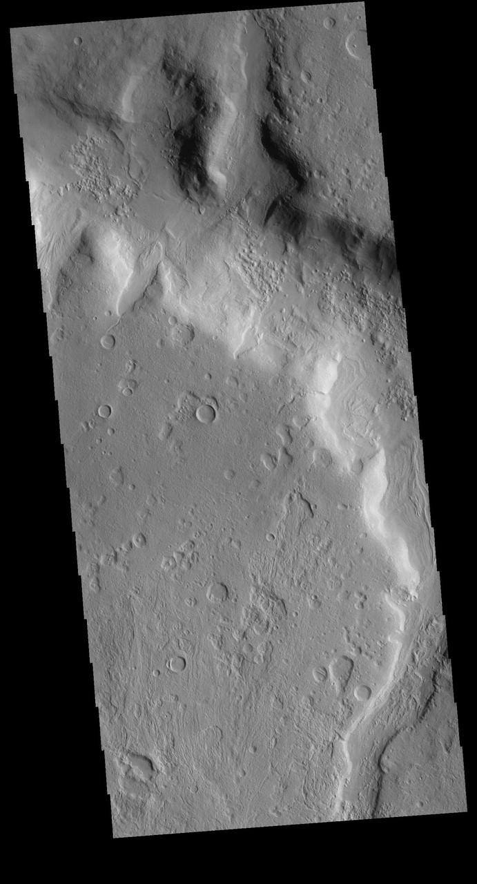 This VIS image shows one of the numerous unnamed channels in northern Terra Sabaea. Orbit Number: 71327 Latitude: 40.229 Longitude: 49.1826 Instrument: VIS Captured: 2018-01-12 05:20 https://photojournal.jpl.nasa.gov/catalog/PIA22384