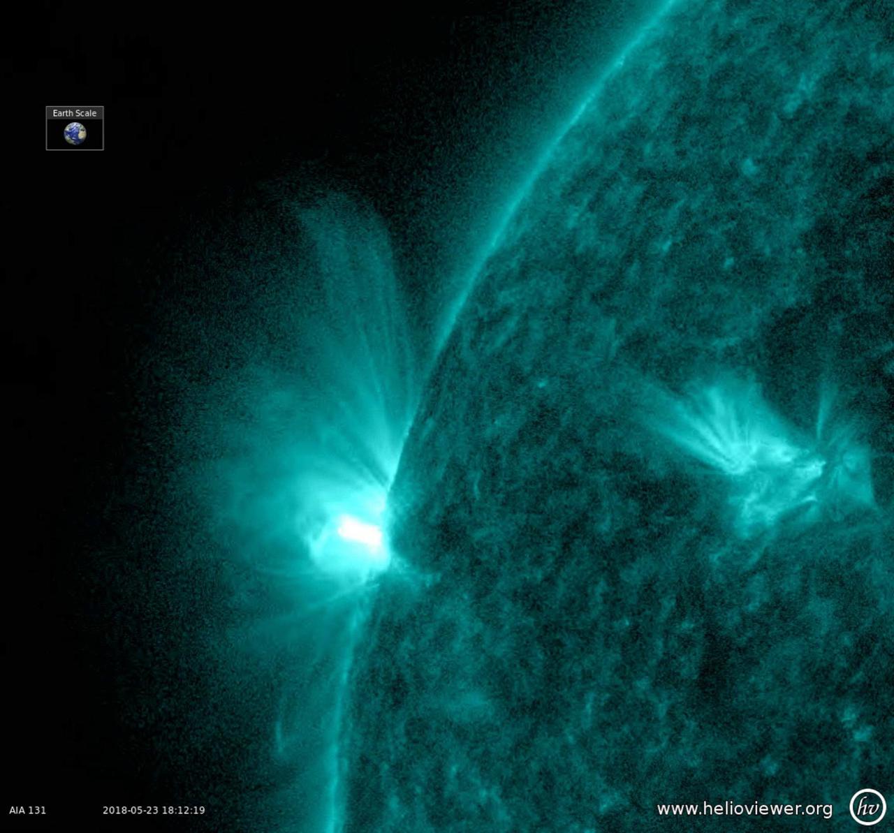 An active region rotated into view and sputtered with numerous small flares and towering magnetic field lines that stretched out many times the diameter of Earth (May 23-25, 2018). Active regions are areas of intense magnetic energy. The field lines are illuminated by charged particles spiraling along them and easiest to discern when viewed in profile. The colorized images were taken in a wavelength of extreme ultraviolet light. Movies are available at https://photojournal.jpl.nasa.gov/catalog/PIA22461