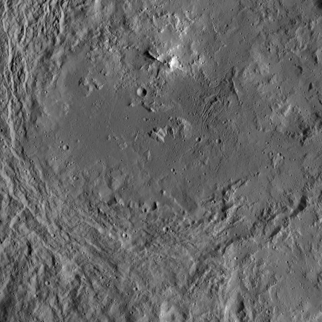This image of Urvara Crater was obtained by NASA's Dawn spacecraft on May 20, 2018 from an altitude of about 920 miles (1480 kilometers).  The center of Urvara Crater is located at about 46 degrees south in latitude and 249 degrees east in longitude.   https://photojournal.jpl.nasa.gov/catalog/PIA22472