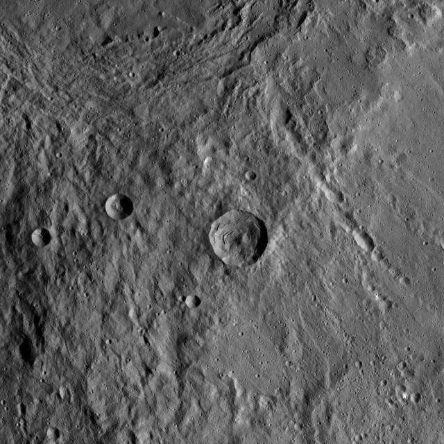 This image of the region between Urvara Crater's eastern rim and Yalode Crater's western rim was obtained by NASA's Dawn spacecraft on May 20, 2018 from an altitude of about 1070 miles (1720 kilometers). The center of this picture is located at about 54 degrees south in latitude and 272 degrees east in longitude. https://photojournal.jpl.nasa.gov/catalog/PIA22516