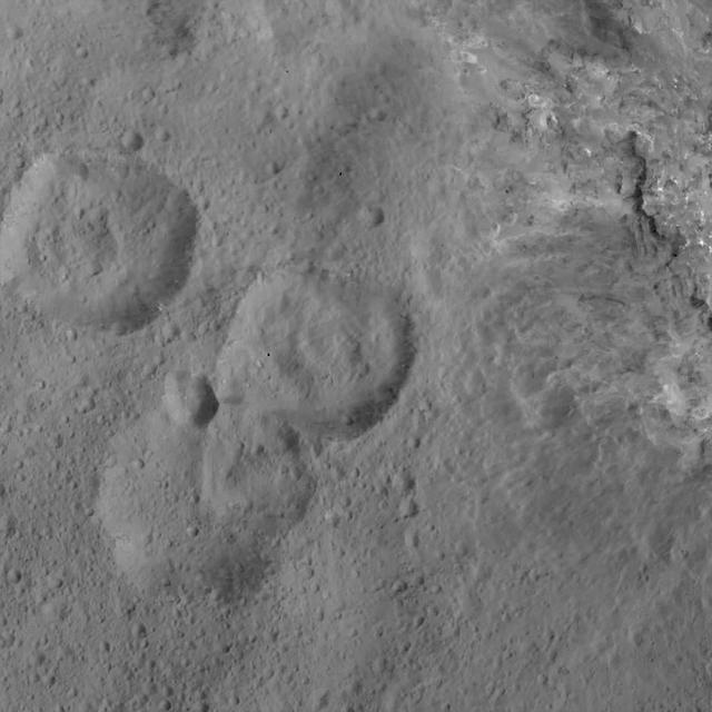 This image of was obtained by NASA's Dawn spacecraft on May 30, 2018 from an altitude of about 420 miles (675 kilometers). Ejecta from Haulani Crater can be seen on the right side of the image.  The center of this picture is located at about 2 degrees south in latitude and 6 degrees east in longitude.   https://photojournal.jpl.nasa.gov/catalog/PIA22518