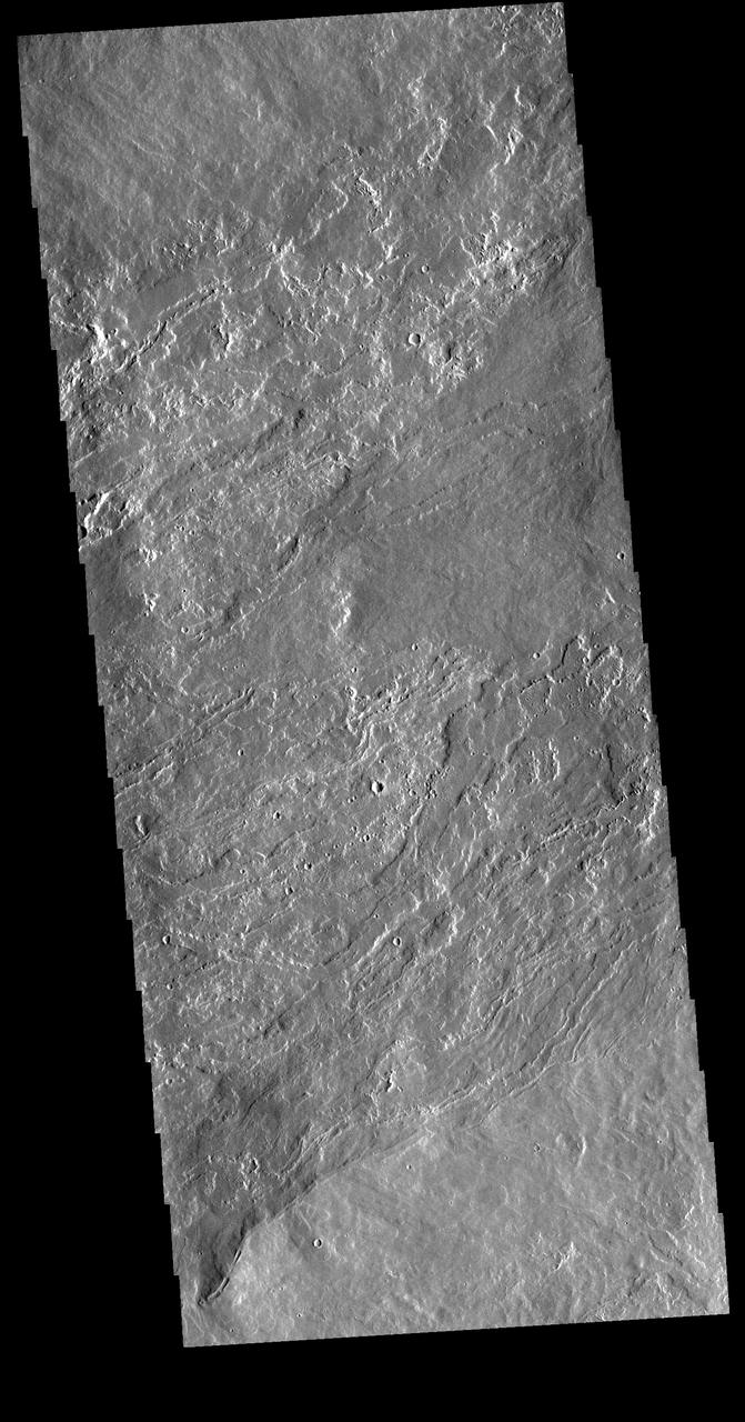 The lava flows seen in the VIS image are located on the northeastern flank of Olympus Mons. The lavas flowed from the lower left side of the image to the upper right.  Orbit Number: 72356 Latitude: 19.9937 Longitude: 231.845 Instrument: VIS Captured: 2018-04-06 23:41  https://photojournal.jpl.nasa.gov/catalog/PIA22581