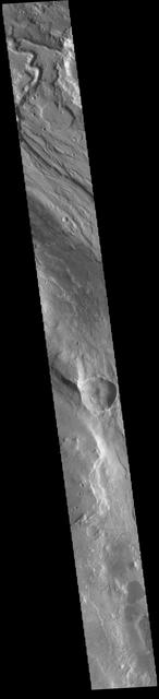 This VIS image shows part of Ares Vallis, one of the large channels in Margaritfer Terra that empty into Chryse Planitia.  Orbit Number: 72477 Latitude: 5.49596 Longitude: 341.524 Instrument: VIS Captured: 2018-04-16 22:49  https://photojournal.jpl.nasa.gov/catalog/PIA22610