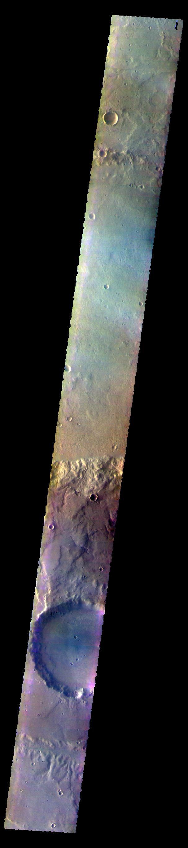 The THEMIS VIS camera contains 5 filters. The data from different filters can be combined in multiple ways to create a false color image. These false color images may reveal subtle variations of the surface not easily identified in a single band image. Today's false color image shows several craters and plains of Terra Cimmeria.  Orbit Number: 59979 Latitude: -39.2993 Longitude: 159.815 Instrument: VIS Captured: 2015-06-22 09:17  https://photojournal.jpl.nasa.gov/catalog/PIA22671