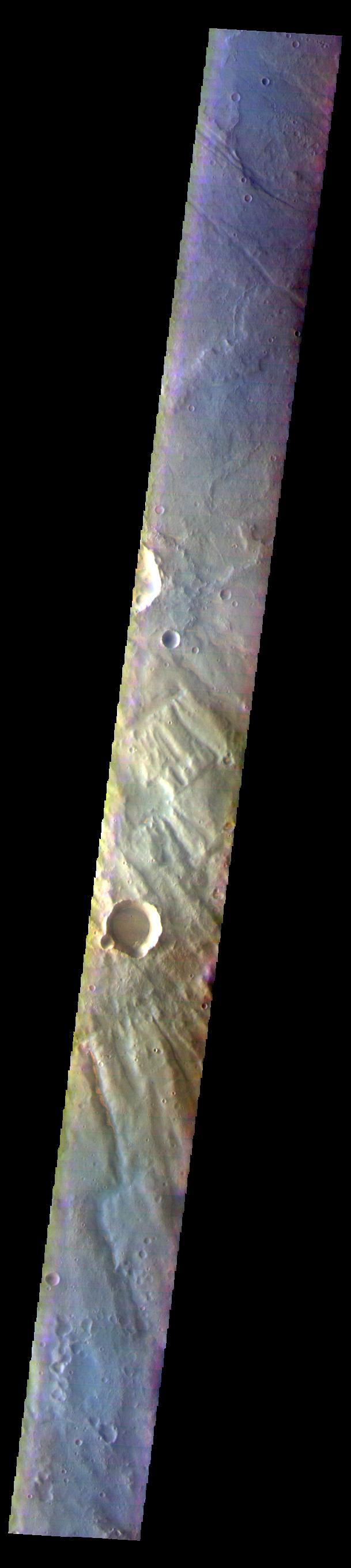 The THEMIS VIS camera contains 5 filters. The data from different filters can be combined in multiple ways to create a false color image. These false color images may reveal subtle variations of the surface not easily identified in a single band image. Today's VIS image is located on the margin between Thaumasia Planum and Coracis Fossae.  Orbit Number: 60137 Latitude: -29.3915 Longitude: 283.341 Instrument: VIS Captured: 2015-07-05 09:29  https://photojournal.jpl.nasa.gov/catalog/PIA22678