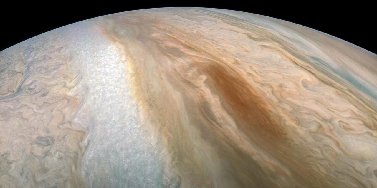 A long, brown oval known as a "brown barge" in Jupiter's South Equatorial Belt is captured in this color-enhanced image from NASA's Juno spacecraft. Brown barges are cyclonic regions that usually lie within Jupiter's dark North Equatorial Belt, although they are sometimes found in the similarly dark South Equatorial Belt as well. They can often be difficult to detect visually because their color blends in with the dark surroundings. At other times, as with this image, the dark belt material recedes, creating a lighter-colored background against which the brown barge is more conspicuous. Brown barges usually dissipate after the entire cloud belt undergoes an upheaval and reorganizes itself. Juno is giving us the first glimpses of the detailed structure within such a barge. This image was taken at 6:26 p.m. PDT on Sept. 6, 2018 (9:26 p.m. EDT) as the spacecraft performed its 15th close flyby of Jupiter. At the time, Juno was 7,425 miles (11,950 kilometers) from the planet's cloud tops, above a southern latitude of approximately 22 degrees. Citizen scientist Kevin M. Gill created this image using data from the spacecraft's JunoCam imager. The image has been rotated 90 degrees to the right from the original image. https://photojournal.jpl.nasa.gov/catalog/PIA22688 . - Enhanced image by Kevin M. Gill (CC-BY) based on images provided courtesy of NASA/JPL-Caltech/SwRI/MSSS