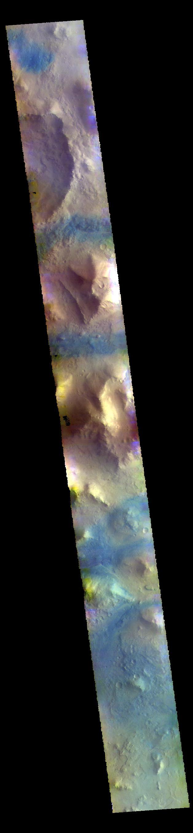 This VIS image shows part of Terra Sabaea, including plains, craters, and mesas. The dark blue tones often indicate locations of basaltic sands.  The THEMIS VIS camera contains 5 filters. The data from different filters can be combined in multiple ways to create a false color image. These false color images may reveal subtle variations of the surface not easily identified in a single band image.  Orbit Number: 60437 Latitude: 29.7491 Longitude: 74.5651 Instrument: VIS Captured: 2015-07-30 03:21  https://photojournal.jpl.nasa.gov/catalog/PIA22707