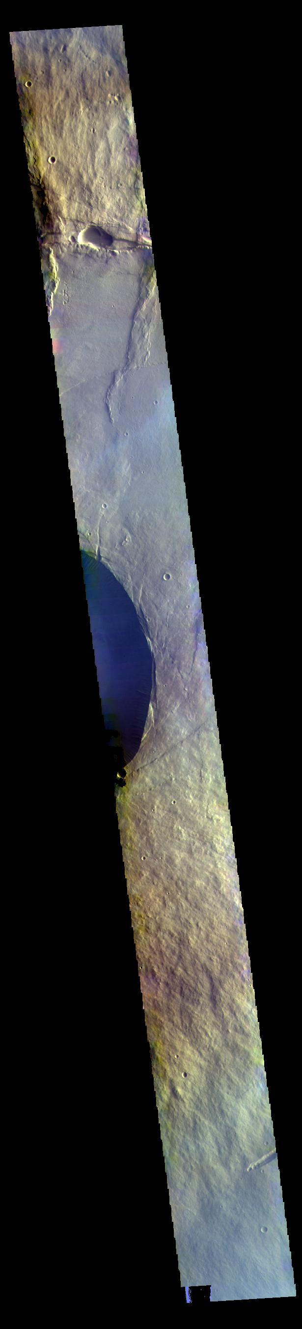 Today's VIS image crosses the flanks and summit of Pavonis Mons.  The THEMIS VIS camera contains 5 filters. The data from different filters can be combined in multiple ways to create a false color image. These false color images may reveal subtle variations of the surface not easily identified in a single band image.  Orbit Number: 60818 Latitude: 0.573053 Longitude: 247.537 Instrument: VIS Captured: 2015-08-30 12:10  https://photojournal.jpl.nasa.gov/catalog/PIA22720
