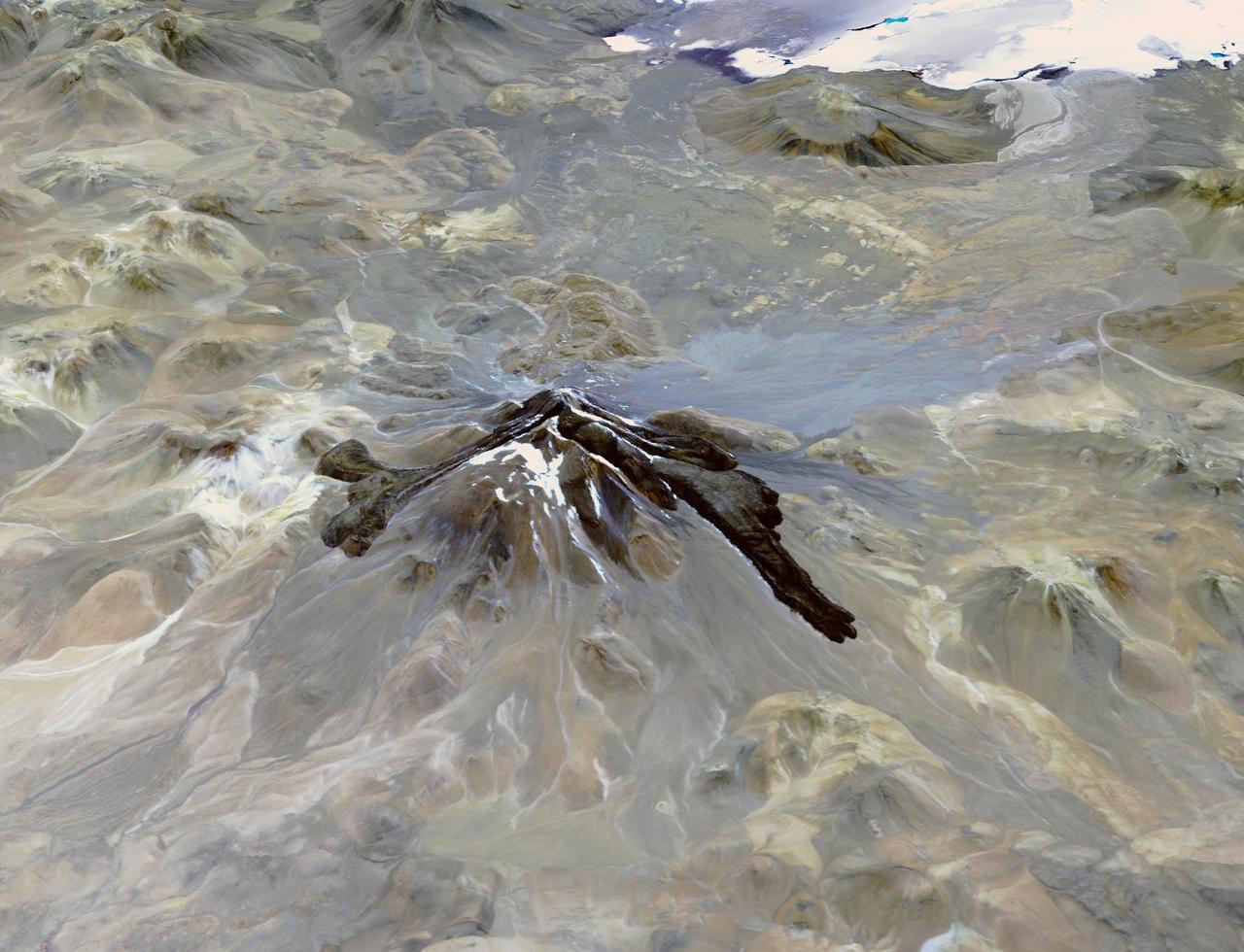 Llullaillaco is a stratovolcano at the border of Argentina and Chile. It lies on a high plateau close to the Atacama Desert. At an elevation of 6723 m ASL, it is the second highest active volcano in the world. About 150,000 years ago the volcano's southeastern flank collapsed, producing a debris avalanche that traveled 25 kilometers. The youngest dated rocks are about 5600 years old; but there are local reports of activity from the 1800s. The perspective image looking east was acquired December 19, 2014 and is located at 24.7 degrees south, 68.5 degrees west.  https://photojournal.jpl.nasa.gov/catalog/PIA22721