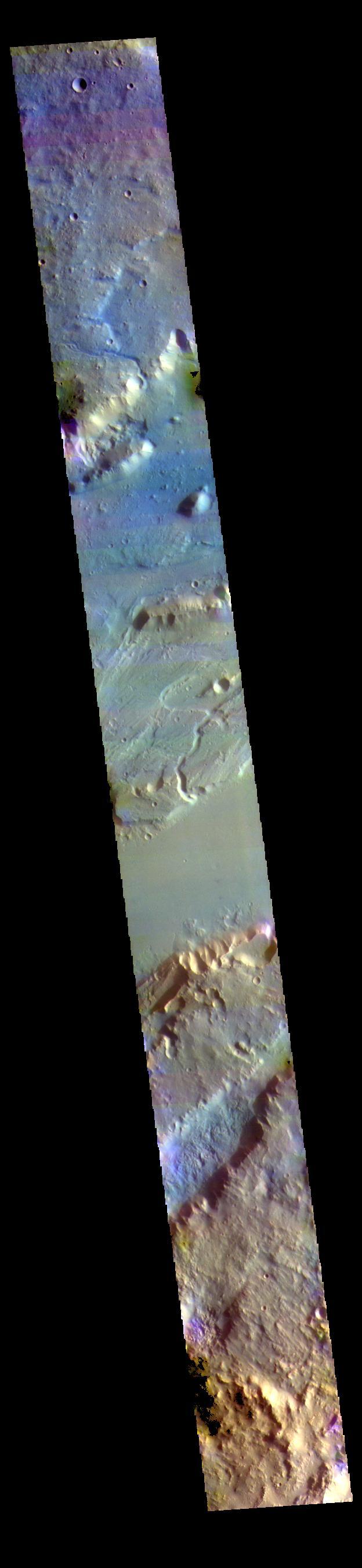 This VIS image shows a section of Kasei Valles. Kasei Valles is a huge outflow channel that drains from the higher elevations of Tharsis down into the lowlands of Chryse Planitia.  The THEMIS VIS camera contains 5 filters. The data from different filters can be combined in multiple ways to create a false color image. These false color images may reveal subtle variations of the surface not easily identified in a single band image.  Orbit Number: 61365 Latitude: 26.3054 Longitude: 303.514 Instrument: VIS Captured: 2015-10-14 13:23  https://photojournal.jpl.nasa.gov/catalog/PIA22790